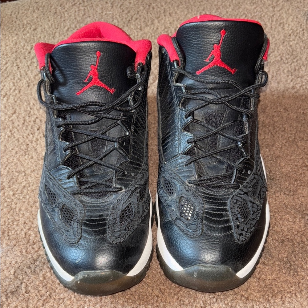 Black and Red Air Jordan 11s Sneakers